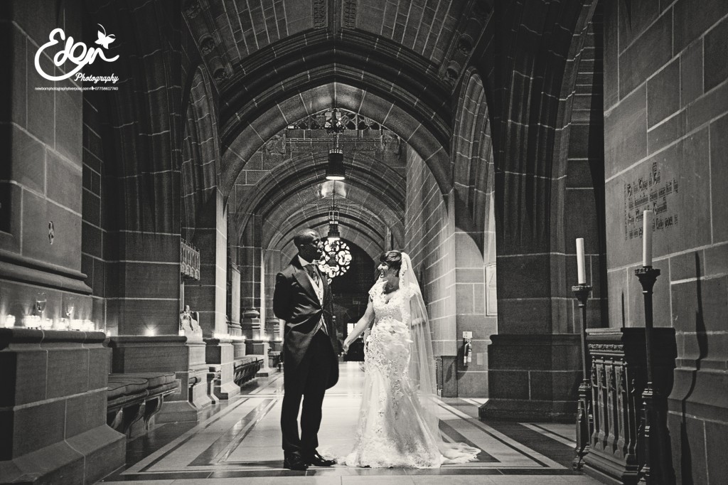 Bride and Groom look at each other in Liverpool Anglican Cathedral